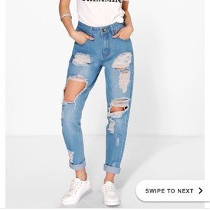 High waisted distressed jeans